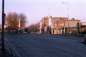 Dark road and sunny houses